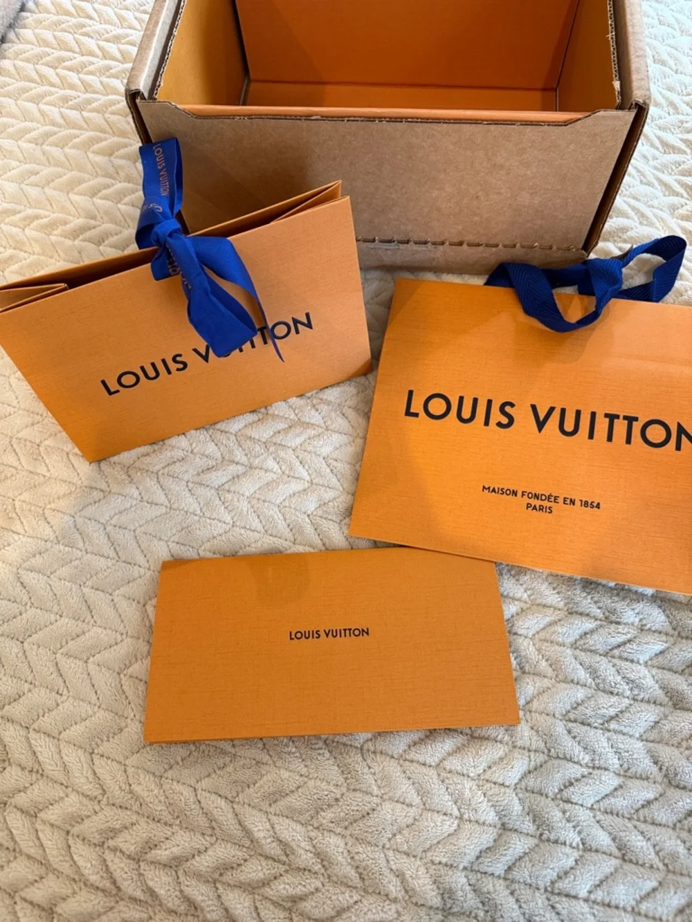 Louis Vuitton Orange Boxes with Blue Ribbon